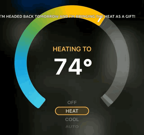 A Thermostat Displays That The Temperature Is 74 Degrees GIF