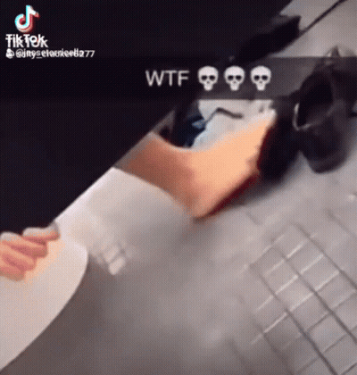 A Tik Tok Video Of A Person Using A Toilet With Skulls On It GIF