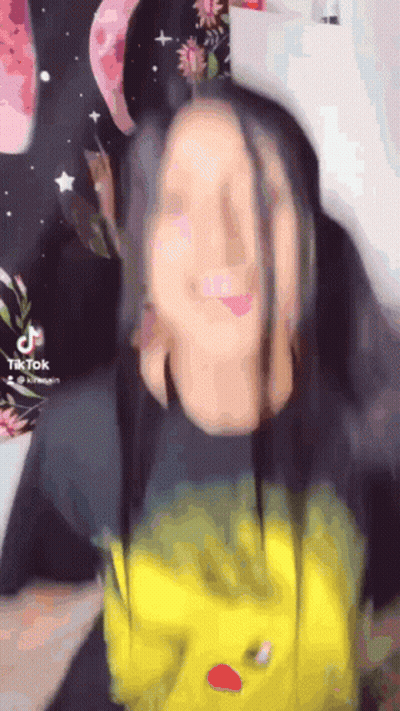 A Tiktok Video Of A Girl With Long Hair GIF