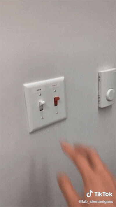 A Tiktok Video Of A Person Turning A Light Switch Off GIF