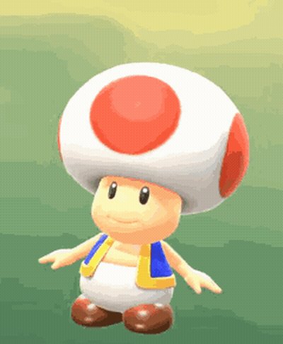 A Toad With A Red Circle On His Head Is Standing On A Green Field . GIF