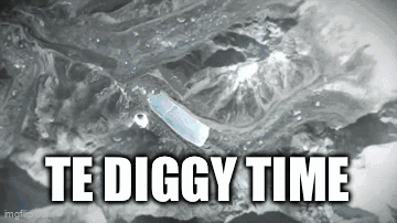 A Toothbrush Is Floating In A Pool Of Water With The Words `` Te Diggy Time '' Written On It . GIF