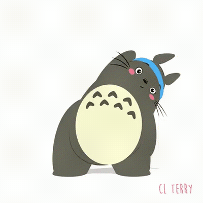 A Totoro From My Neighbor Totoro Is Wearing A Blue Headband And Doing Exercises . GIF