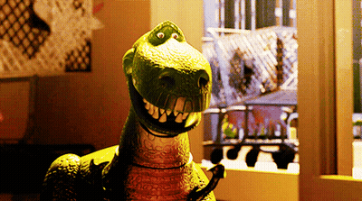 A Toy Dinosaur From The Movie Toy Story GIF