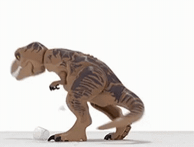 A Toy Dinosaur Is Standing On A White Surface With Its Mouth Open And A Plastic Bottle In Its Mouth . GIF