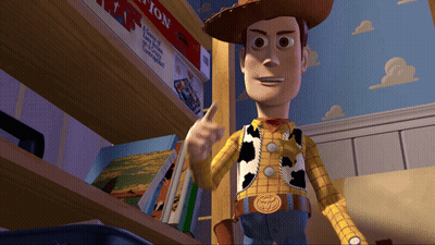A Toy Story Character Is Standing In Front Of A Bookshelf GIF