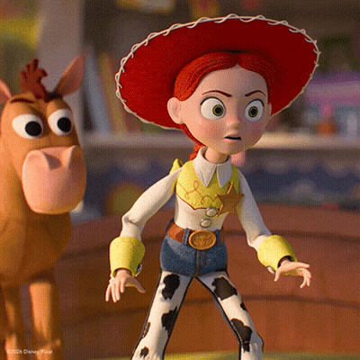 A Toy Story Character Is Standing Next To A Stuffed Animal GIF