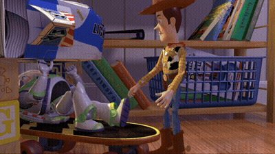 A Toy Story Scene With Woody And Buzz Lightyear Playing GIF