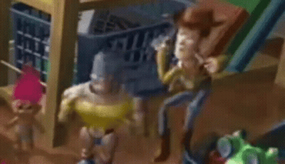 A Toy Story Scene With Woody , Buzz Lightyear , And Trolls . GIF