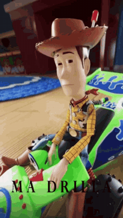 A Toy Story Woody Doll Is Sitting In A Green Toy Car GIF