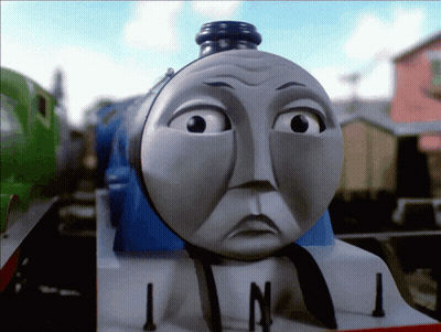 A Toy Train With A Sad Look On Its Face And The Number 1 On The Front GIF