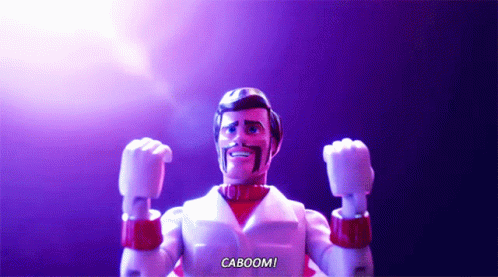 A Toy With A Beard Says Caboom In A Purple Background GIF