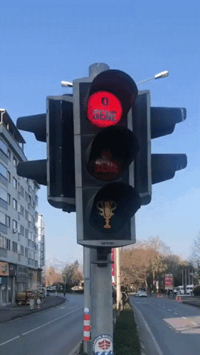 A Traffic Light With A Red Light That Says Sema On It GIF