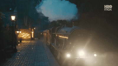 A Train That Has The Number 5972 On The Side Of It GIF