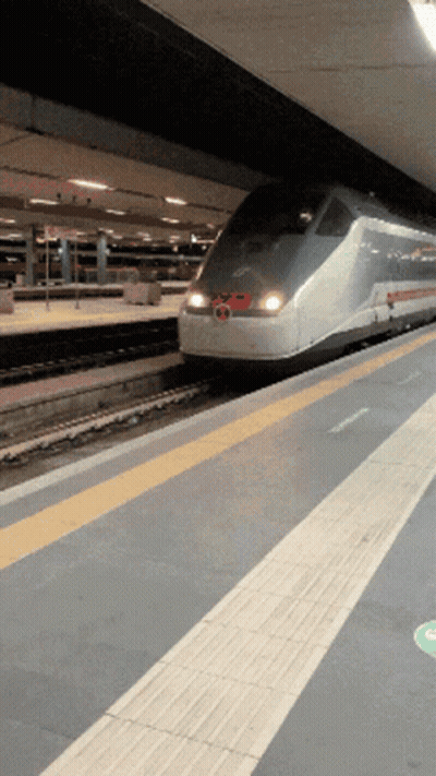 A Train With A Red Circle On The Front Of It GIF