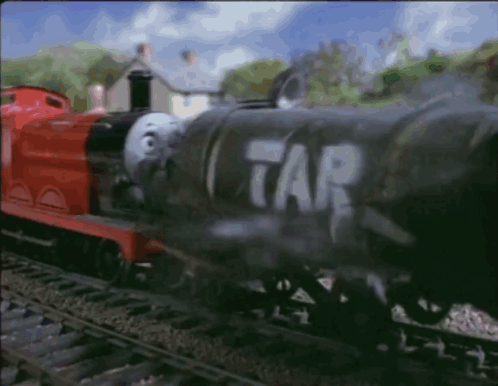 A Train With The Word Tar Painted On The Side GIF