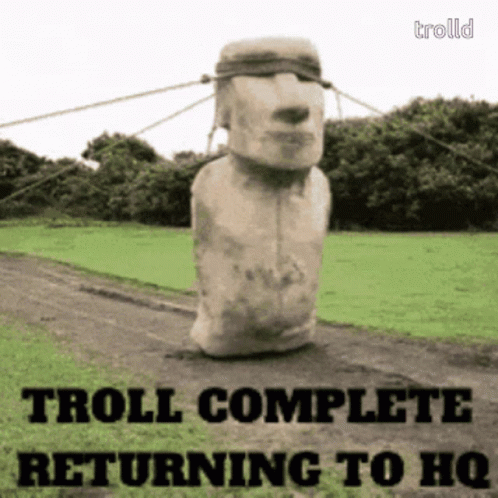 A Troll Complete Returning To Hq Poster With A Stone Statue GIF