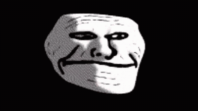 A Troll Face With A Smile On It 'S Face On A Black Background GIF