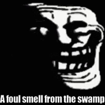 A Troll Face With The Words `` A Foul Smell From The Swamp '' Written Next To It . GIF