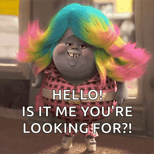 A Troll With A Colorful Wig Says Hello Is It Me You 'Re Looking For GIF