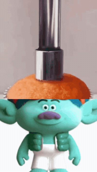 A Troll With A Purple Nose Is Standing Next To A Plunger GIF