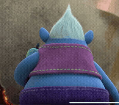A Troll With A Purple Vest And Purple Shorts GIF
