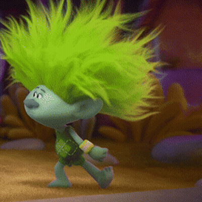 A Troll With Bright Green Hair Is Walking GIF