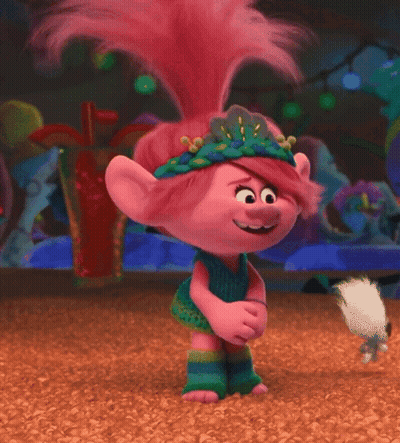 A Troll With Pink Hair And A Flower Crown On GIF