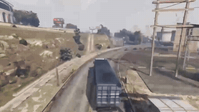A Truck Is Driving Down A Road With A Sign That Says F On It GIF