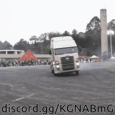 A Truck Is Driving Down A Road With The Words Discord.gg/kgnabmg Written Below It GIF