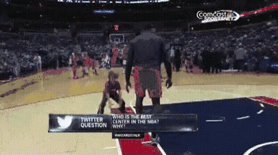 A Twitter Question Is Being Asked At A Basketball Game Sponsored By Comcast GIF