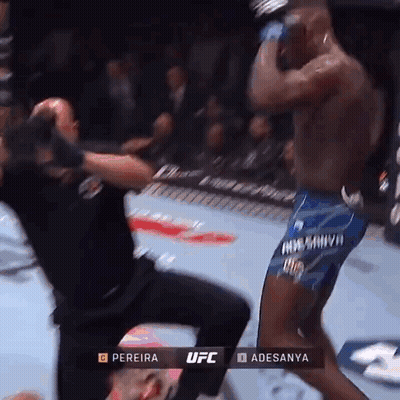 A Ufc Fight Between Pereira And Adesanya Takes Place In A Boxing Ring GIF