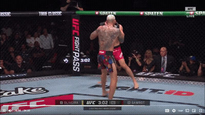 A Ufc Fight Pass Advertisement Is Displayed On A Screen GIF