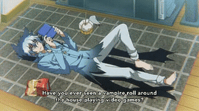 A Vampire Laying On The Floor With The Words Have You Ever Seen A Vampire Roll Around The House Playing Video Games Writ GIF