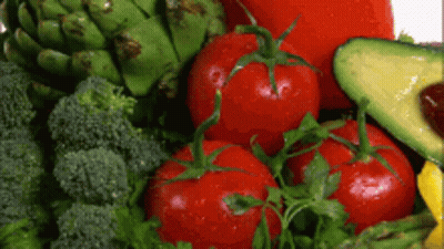 A Variety Of Fresh Vegetables Including Broccoli Tomatoes Avocado And Artichokes GIF