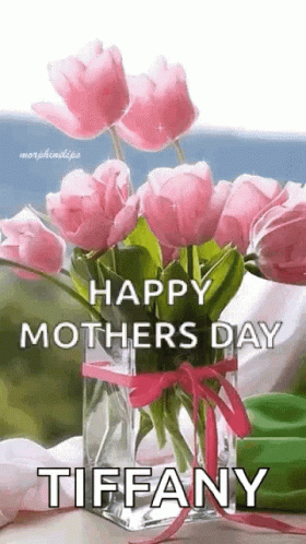 A Vase Filled With Pink Flowers With The Words `` Happy Mothers Day Tiffany '' Written On It . GIF