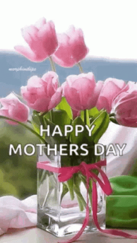 A Vase Filled With Pink Tulips And The Words `` Happy Mother 'S Day '' . GIF