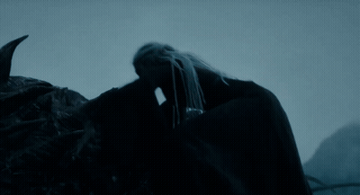 A Very Large Dragon With A Very Long Neck And Sharp Teeth GIF