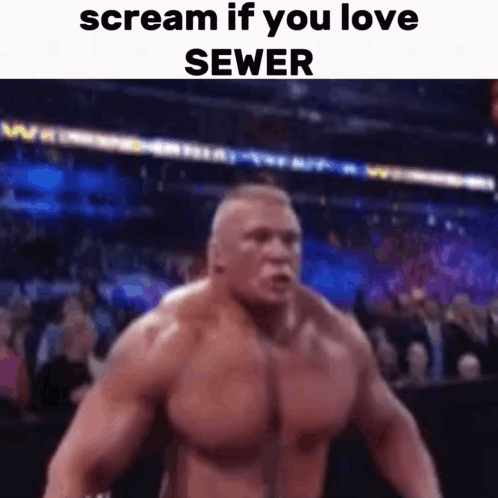 A Very Muscular Man Is Screaming In Front Of A Crowd While Standing In Front Of A Sewer . GIF