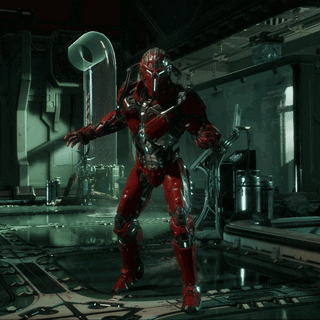 A Video Game Character In Red Armor Is Standing In A Room GIF
