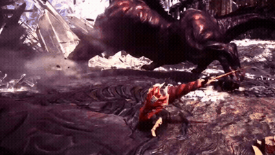 A Video Game Character Is Fighting A Large Monster GIF
