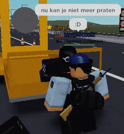 A Video Game Character Is Holding A Gun In Front Of A Yellow Booth . GIF