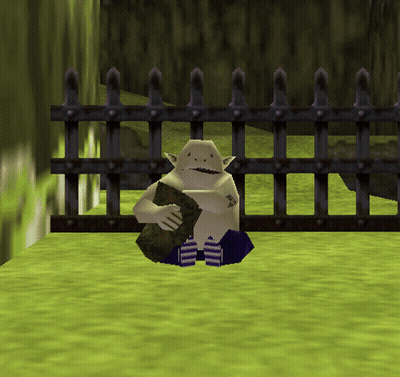 A Video Game Character Is Sitting In Front Of A Fence Holding A Rock GIF