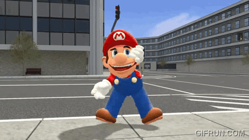 A Video Game Character Named Mario Is Standing On A Street In Front Of A Building GIF