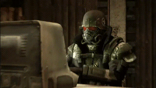 A Video Game Character Wearing A Helmet With A Red Visor GIF