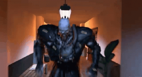 A Video Game Character With A Lantern On His Head GIF