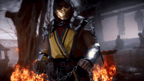 A Video Game Character With Chains Around His Waist Is Standing In Front Of A Fire GIF