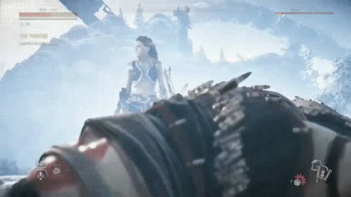 A Video Game Screen Shows A Woman Standing Next To A Man Laying On The Ground GIF