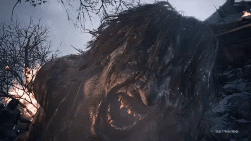 A Video Game Screenshot Of A Giant Monster With A Huge Head . GIF