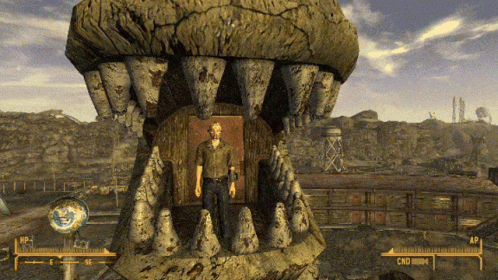 A Video Game Shows A Man Standing In Front Of A Large Mouth With The Letters Cmd On It GIF
